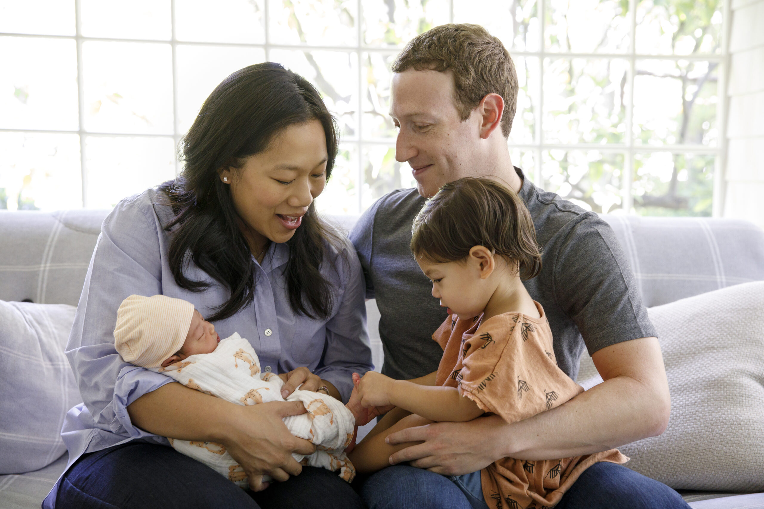 With his wife, Priscilla Chan, their newborn daughter, August, and her sister, Maxima, in Palo Alto, California, 2017